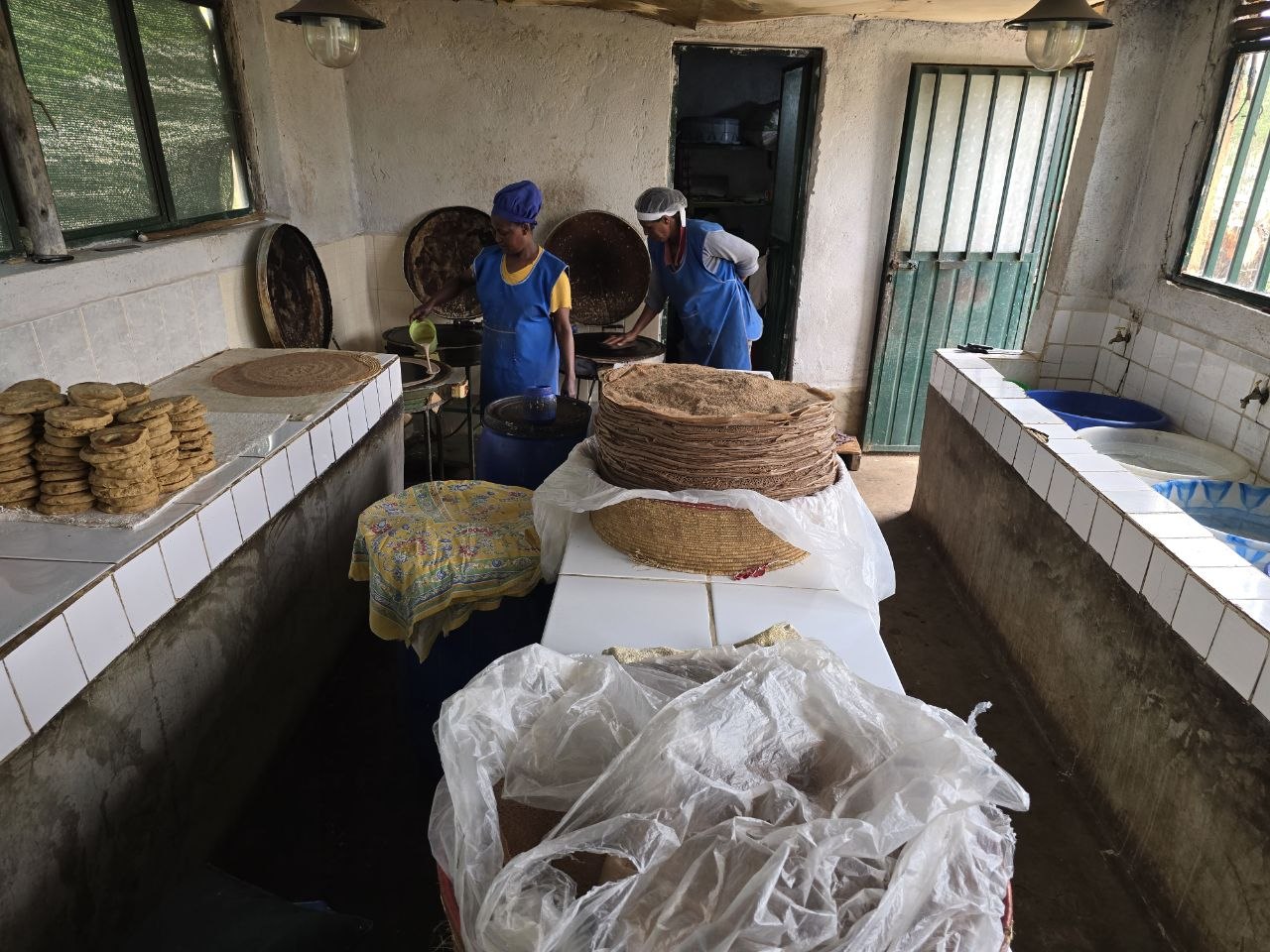 The farm kitchen preparing fresh injera for the daily community lunch